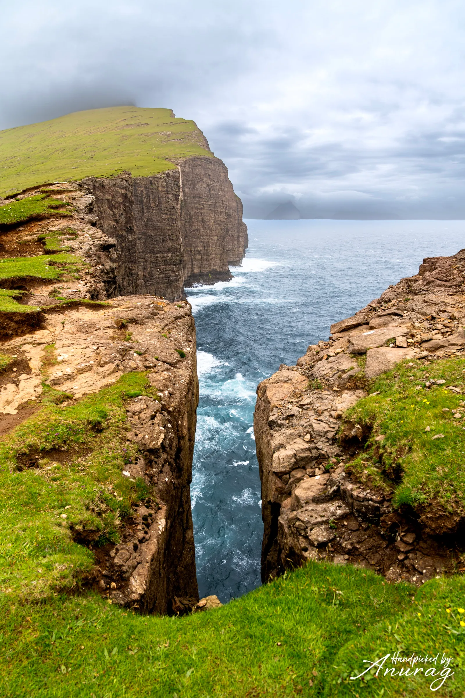 Sea cliffs and a deep gorge on a Faroese island